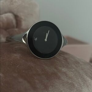 Calvin Klein Black and Silver Vintage Bangle Watch